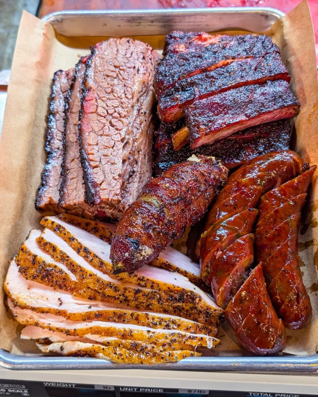 Delicious BBQ spread with smoked meats and sides
